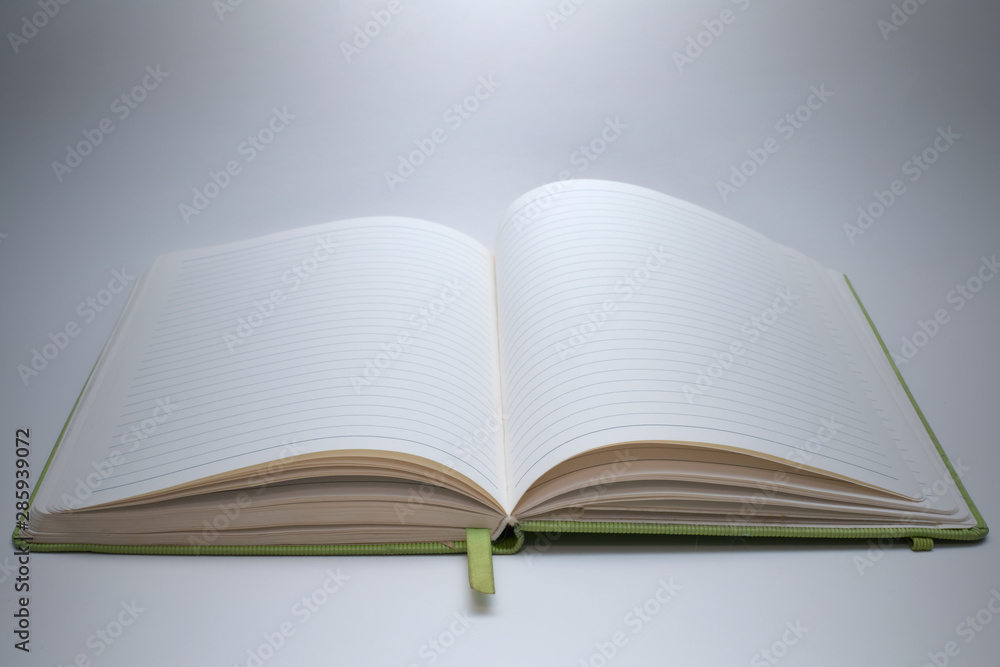 Paper notebook or note pad with empty pages Paper notebook or note pad with empty pages