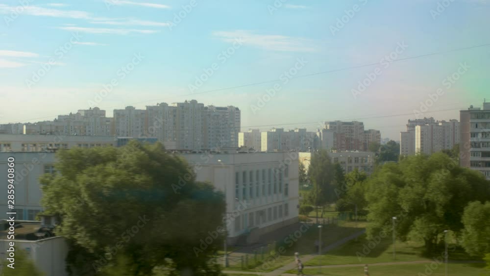 Panoramic view of the city from the window of a moving subway train Panoramic view of the city from the window of a moving subway train