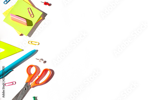Colorful School stationery concept flat lay on the white paper background. Top view. Copy space