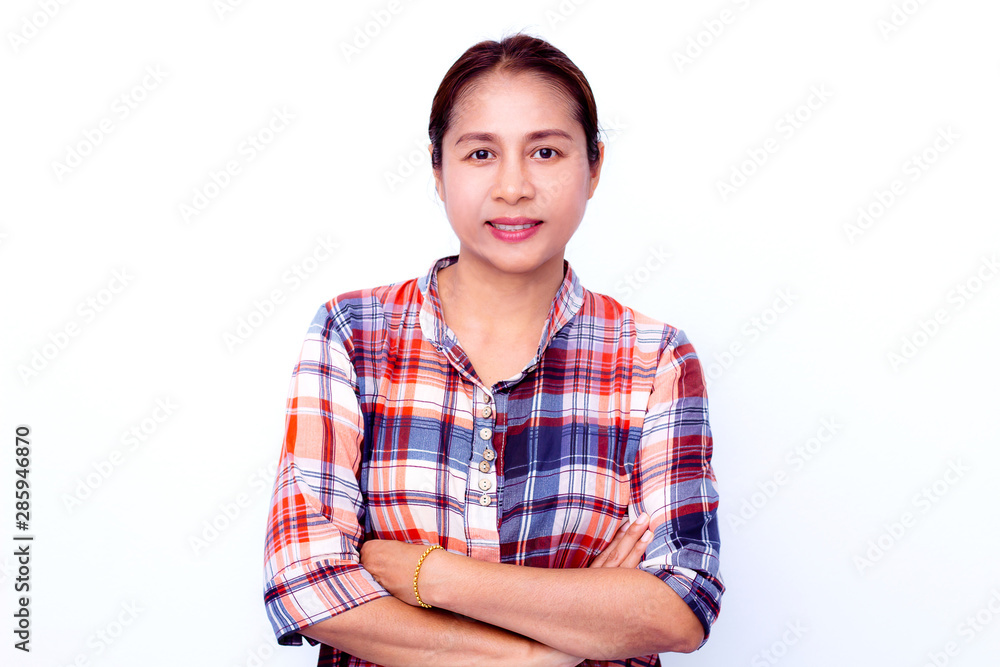 Portrait of beautiful asian woman with curly hair style smiling with joyful and charming on white background isolate. She has folded arms. Portrait of beautiful asian woman with curly hair style smiling with joyful and charming on white background isolate. She has folded arms.