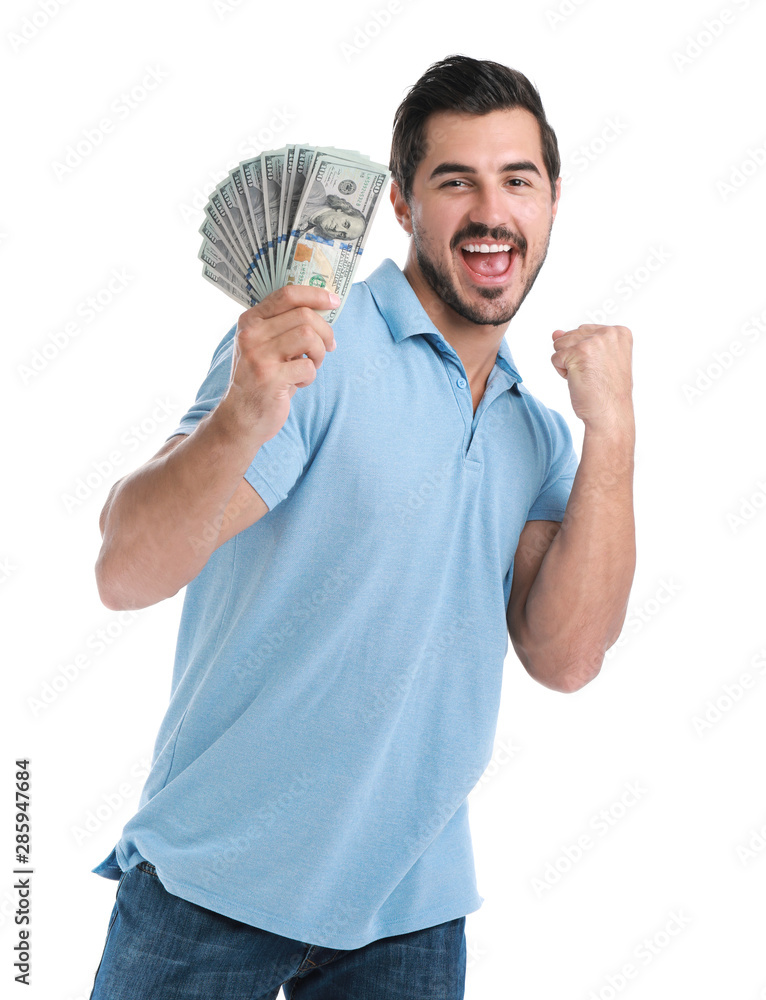 Handsome young man with dollars on white background Handsome young man with dollars on white background