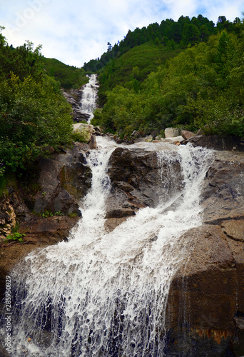 Waterfall at hike in Zillertal Alps from Schlegeisspeicher  water reservoir  to Olperer H  tte  hut 