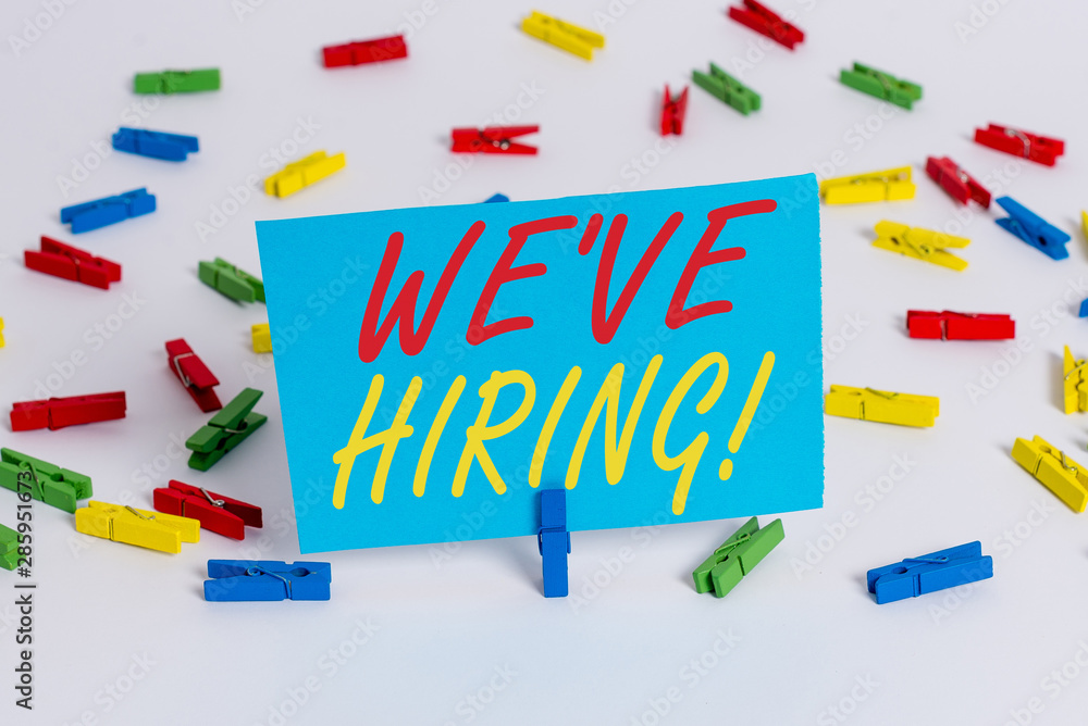 Text sign showing We Are Hiring. Business photo text recently you employ someone or pay someone to do particular job Colored clothespin papers empty reminder white floor background office Text sign showing We Are Hiring. Business photo text recently you employ someone or pay someone to do particular job Colored clothespin papers empty reminder white floor background office
