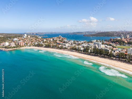 Panoramic high angle drone view of Manly Beach and the Sydney Harbour area. Manly is a popular suburb of Sydney, New South Wales, Australia. Famous tourist destination, easy to reach by ferry from CBD