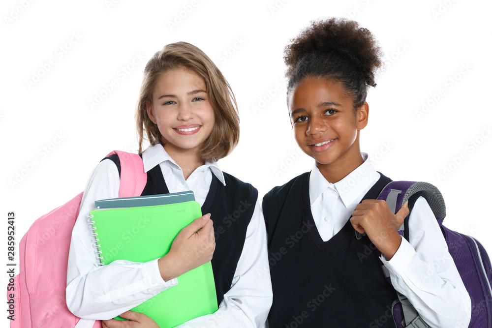 Happy girls in school uniform on white background Happy girls in school uniform on white background