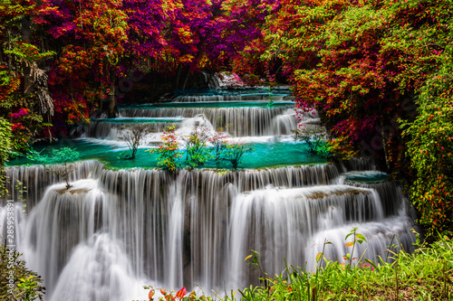  amazing of huay mae kamin waterfall in colorful autumn forest at Kanchanaburi, thailand