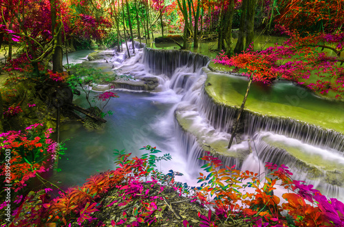 amazing of huay mae kamin waterfall in colorful autumn forest at Kanchanaburi, thailand