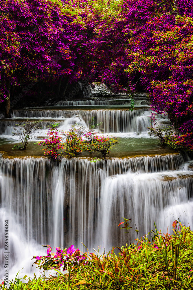 amazing of huay mae kamin waterfall in colorful autumn forest at Kanchanaburi, thailand amazing of huay mae kamin waterfall in colorful autumn forest at Kanchanaburi, thailand