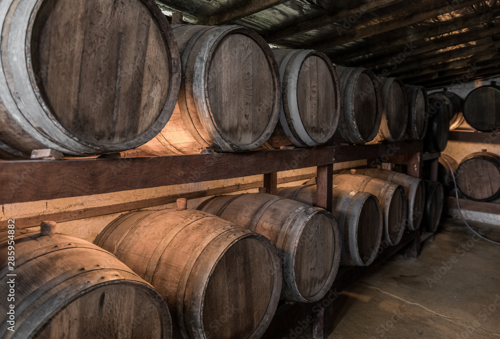 Wooden barrels with Cachaca in a destillery