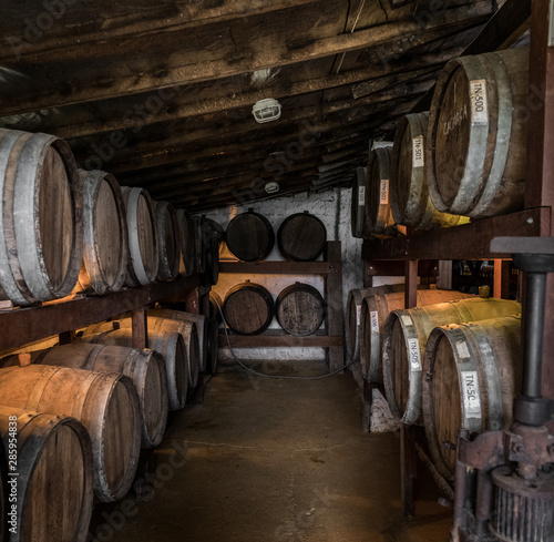 Wooden barrels with Cachaca in a destillery