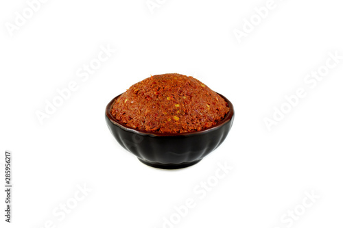 thai red curry paste isolated on white background photo