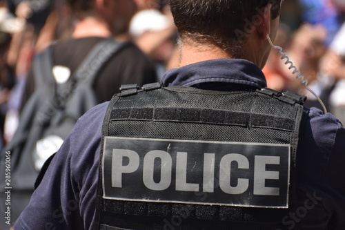Fototapeta French policeman photographed from behind during a protest