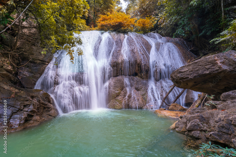 Waterfall in deep rain forest jungle (Thung Nang Khruan Waterfall) Thailand