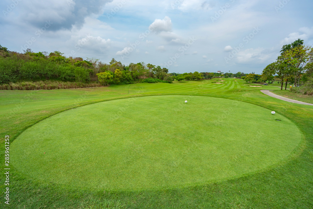 Golfcourse, Beautiful landscape of a golf court with trees and green grass Golfcourse, Beautiful landscape of a golf court with trees and green grass