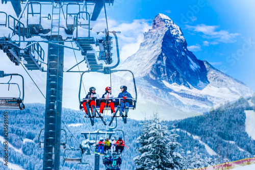amazing beautiful view of Gornergrat, Zermatt, Matterhorn ski resort in Switzerland with cable chairlift transport photo