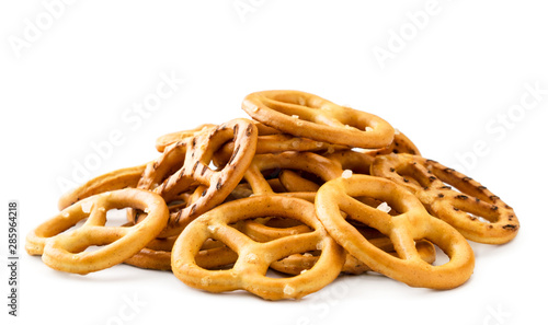 Canvas Print Pile of mini pretzels close-up on a white background. Isolated