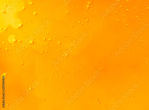 Honey background with air bubbles. Place for text photo