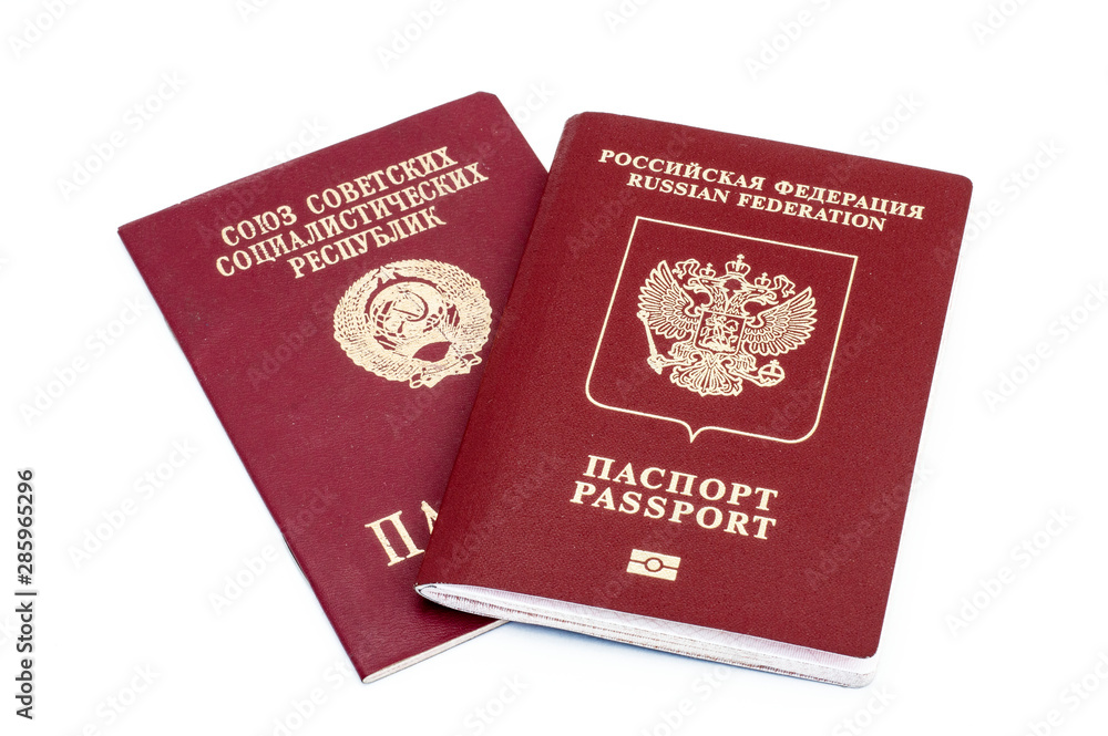 Passports of the Russian Federation and the Soviet Union on a white background. Passports of the Russian Federation and the Soviet Union on a white background.