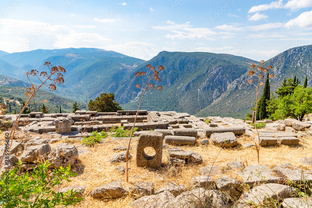 Ancient ruins of the Greek civilization at the Delphi Archaeological Site in Delphi, Greece