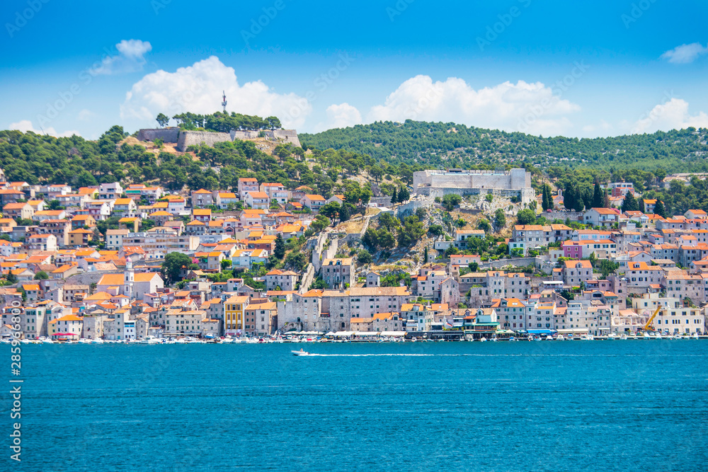 City of Sibenik and old fortresses on the Adriatic coast in Dalmatia, Croatia, panoramic view from the sea
