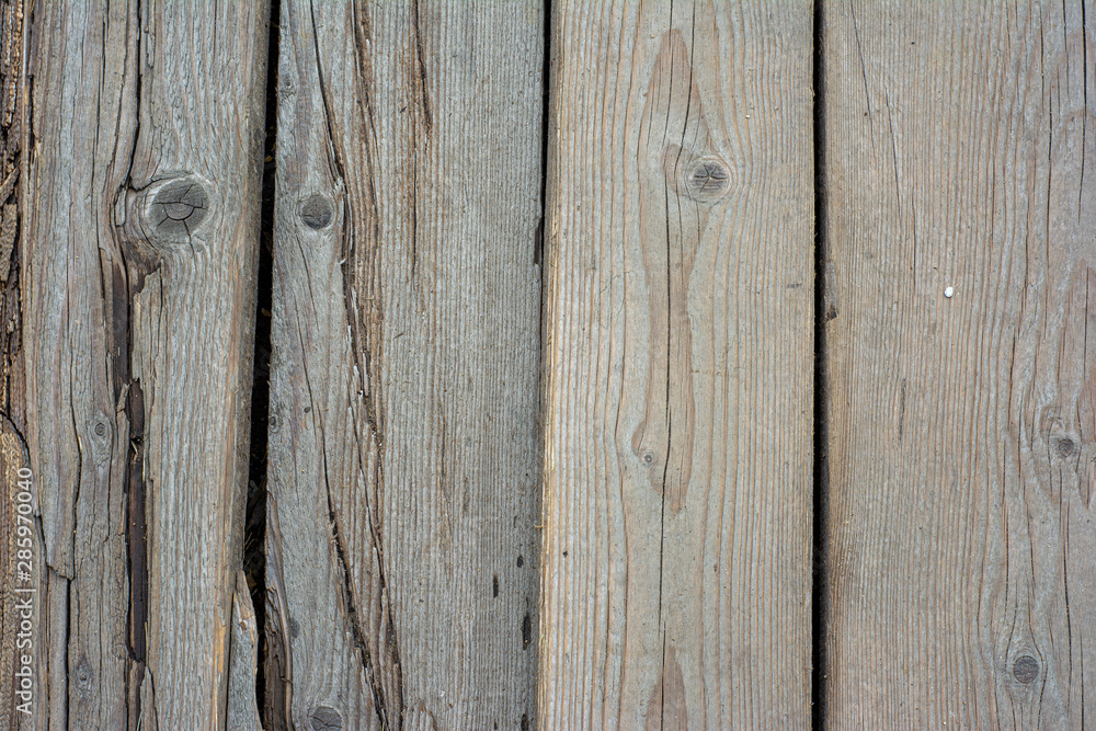 Naklejka premium Background from carelessly laid wooden boards with large slots