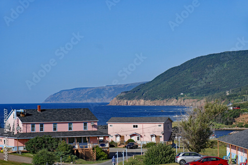 mountainous region of the Cabot Trail in Cape Breton Island, Nova Scotia, with waterfront motel © Spiroview Inc.