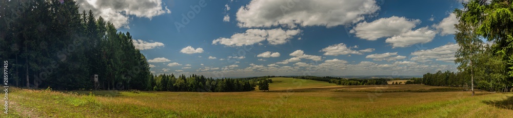 Meadows and pasture land near vanished village Smrkovec in summer hot day Meadows and pasture land near vanished village Smrkovec in summer hot day
