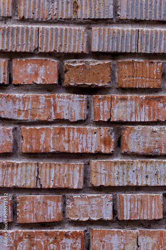 Old red brick wall  rustic texture  design vertical background.