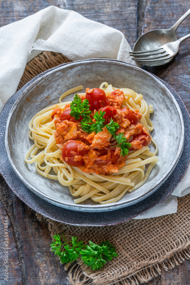 Chilli crab and cherry tomato linguine pasta Stock Photo | Adobe Stock