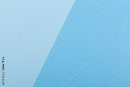 Paper blue empty background  geometrically located. Color blank for presentations  copy space.