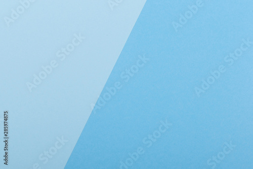 Paper blue empty background, geometrically located. Color blank for presentations, copy space.