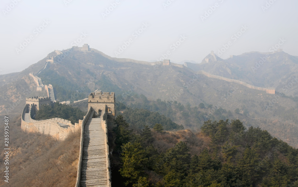 Obraz premium The Great Wall of China. This section of the Great Wall is Jinshanling, a wild part with scenic views. The Great Wall of China near Beijing. Wild Great Wall of China, Jinshanling, Beijing, UNESCO site