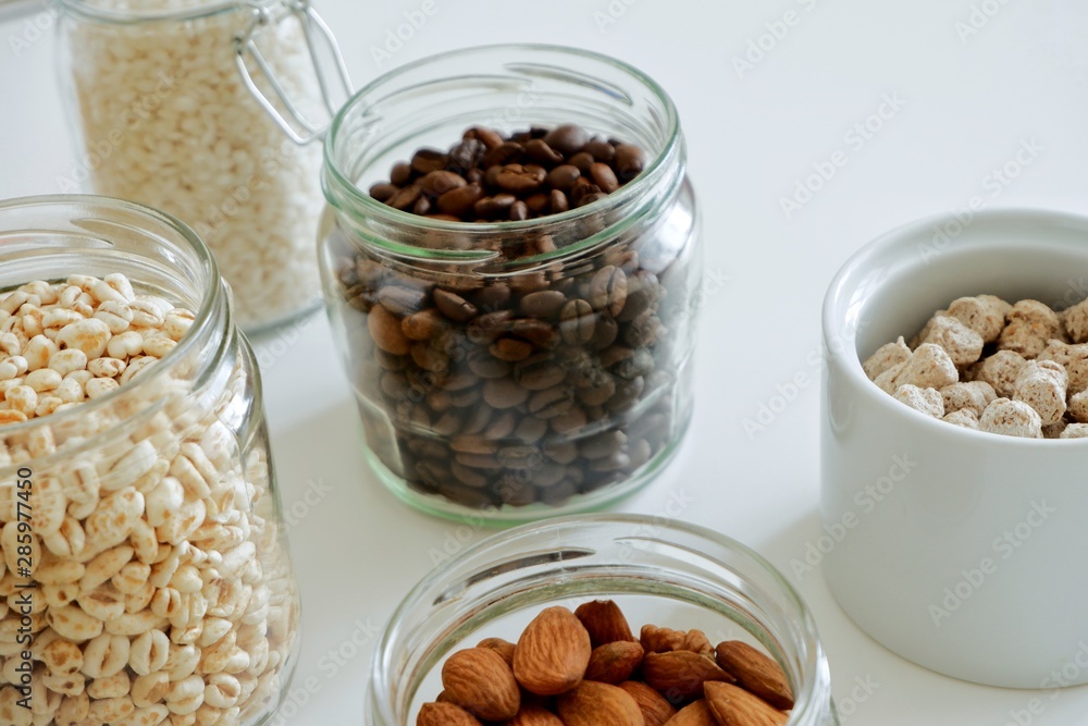 Various cereals, coffee, nuts, bran in glass jars. Zero waste concept, free plastic. Various cereals, coffee, nuts, bran in glass jars. Zero waste concept, free plastic.