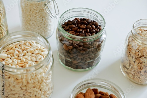 Various cereals, coffee, nuts, bran in glass jars. Zero waste concept, free plastic.