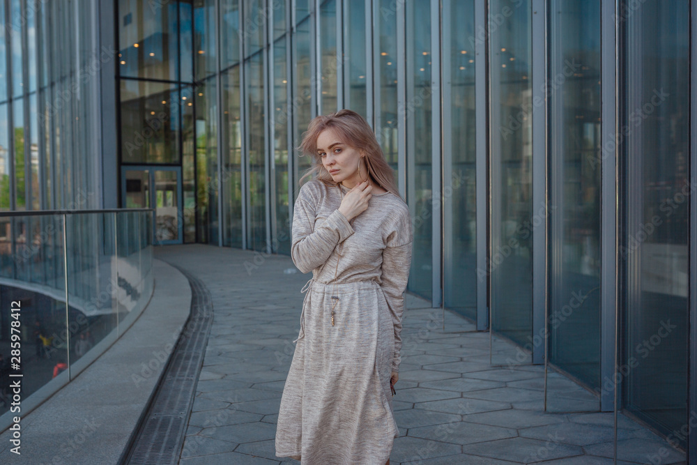Beautiful woman walks through the streets of Moscow Beautiful woman walks through the streets of Moscow