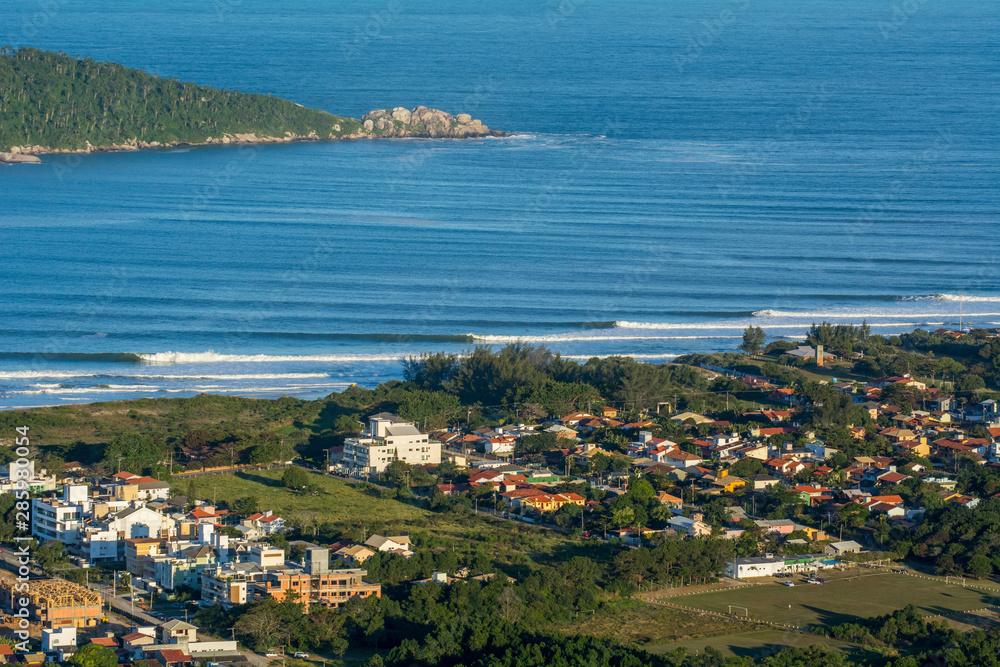 Aerial view from Morro do Lampiao at good wave lines in Campeche beach Florianópolis Brazil
