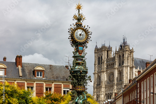 View of the Dewailly clock with the Cathedral in the background,France, Amiens photo