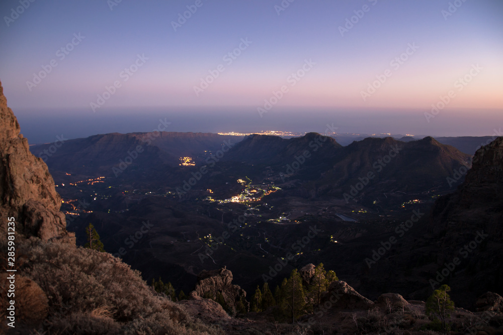 Fototapeta premium Blue -purple Sunset on top of Pico de las Nieves on the beautiful Island Gran Canaria in Spain