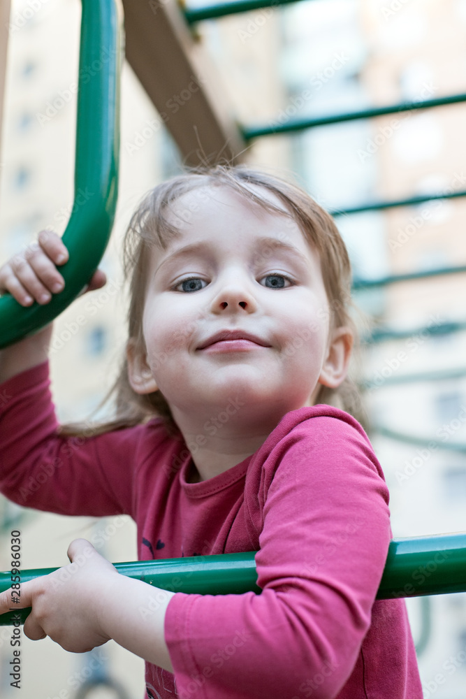 cute smiling girl on outdoor playground background cute smiling girl on outdoor playground background