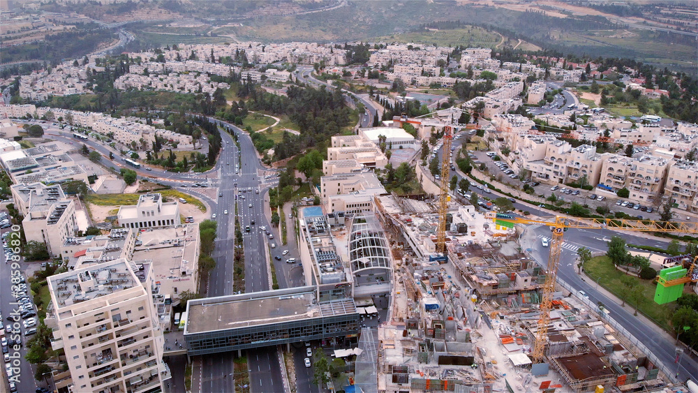 Jerusalem traffic landscape and construction site Aerial view Flying over Jerusalem traffic landscape and construction site 
