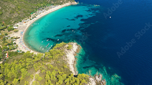 Aerial drone photo of famous turquoise sandy beach of Armenistis in South Sithonia peninsula, Halkidiki, North Greece