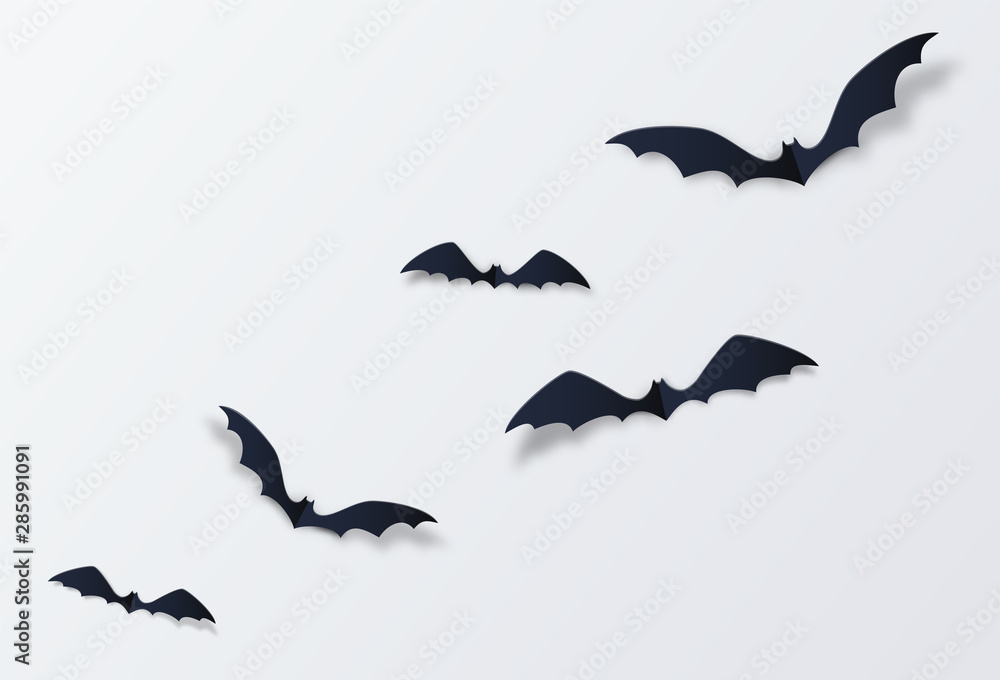 Naklejka premium Halloween bat vector decor background. Paper cut style. Black vampire flittermouse flying over white backdrop