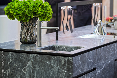 Beautiful modern kitchen design, kitchen faucet and kitchen decor, gray marble kitchen island
