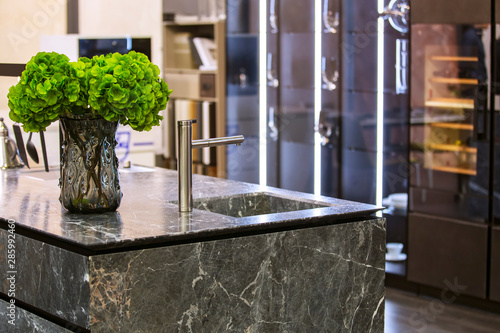 Beautiful modern kitchen design, kitchen faucet and kitchen decor, gray marble kitchen island