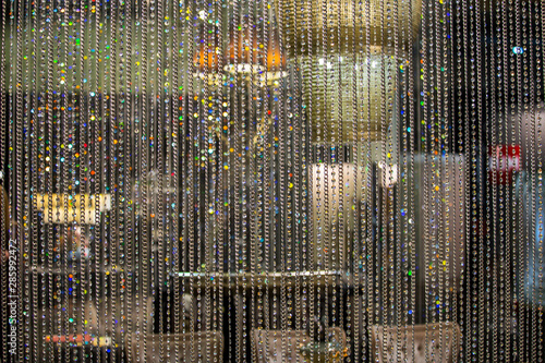 Curtain of glass drops. Crystal beads blind curtain background, concept of Luxury . backdrop for wedding celebration Invitation
