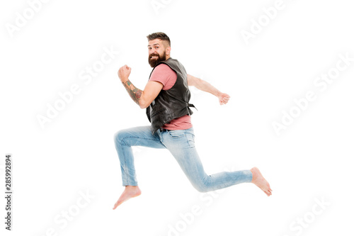 Last chance. Following his dream. Barefoot guy hurries to beach. Run away. Hurry up. Guy happy cheerful face having fun run jumping. Life in motion. Man bearded guy run away. Always in motion