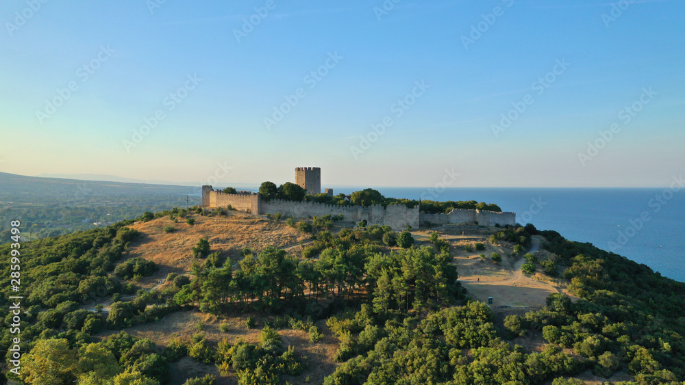 Aerial drone view of iconic and historic medieval castle of Platamonas built in the slopes of Mount Olympus in Pieria area, North Greece