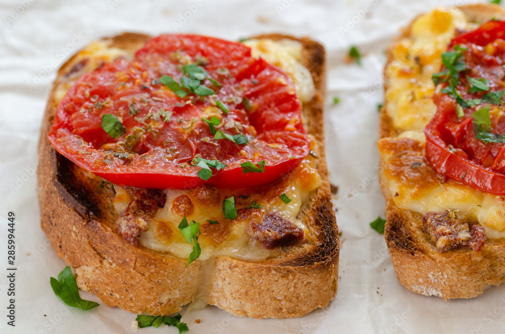 Healthy breakfast at home.Two slices of bread with cheese and tomato Healthy breakfast at home.Two slices of bread with cheese and tomato