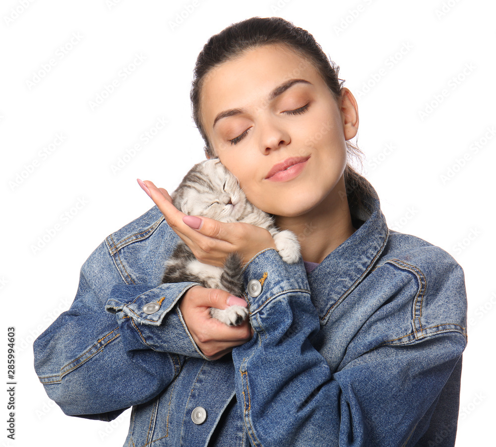Beautiful young woman with cute little kitten on white background Beautiful young woman with cute little kitten on white background