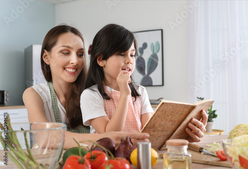 Mother with cute daughter r...
